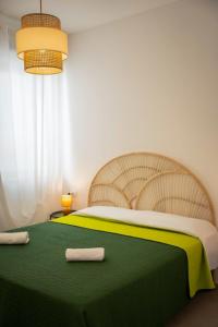 Voodi või voodid majutusasutuse Aura Apartments toas