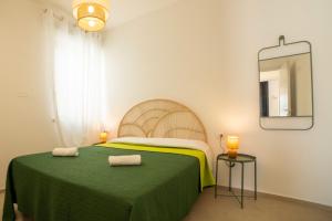 Voodi või voodid majutusasutuse Aura Apartments toas