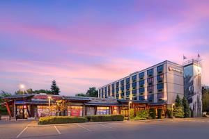 a rendering of a hotel with a parking lot at Best Western Plus Barclay Hotel in Port Alberni