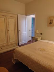 A bed or beds in a room at Casa Vacanza Villa Filomena