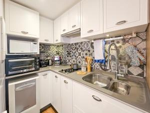 Η κουζίνα ή μικρή κουζίνα στο Residencial Green Center - Curitiba