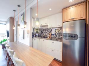 Η κουζίνα ή μικρή κουζίνα στο Residencial Green Center - Curitiba