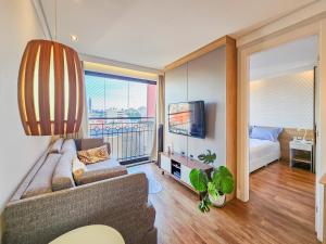 Ένα ή περισσότερα κρεβάτια σε δωμάτιο στο Residencial Green Center - Curitiba +6 φωτογραφίες