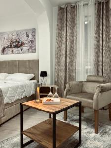 Posezení v ubytování GreenHill Apartments