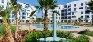 Bazén v ubytování Appartement costa mar martil nebo v jeho okolí + 33 fotografií
