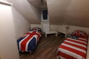 Ένα ή περισσότερα κρεβάτια σε δωμάτιο στο Appartement de charme centre ville