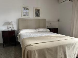 Ένα ή περισσότερα κρεβάτια σε δωμάτιο στο La Casita de los Cholis