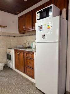 Η κουζίνα ή μικρή κουζίνα στο La Casita de los Cholis +4 φωτογραφίες