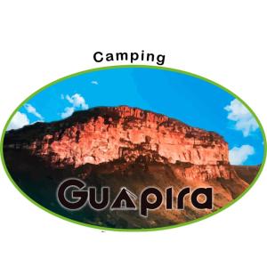 uma imagem de uma montanha com as palavras camping guuna em Camping Guapira em Vale do Capão