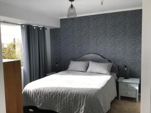 Voodi või voodid majutusasutuse Fossil Coast B&B toas