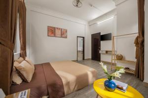 KLy Apartment Hotel客房内的一张或多张床位