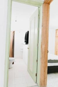 Ένα ή περισσότερα κρεβάτια σε δωμάτιο στο Casa Oaxaca