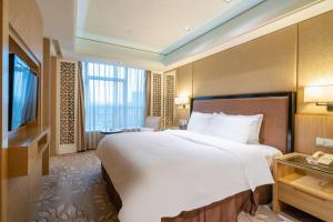 Voodi või voodid majutusasutuse C&D Hotel Quanzhou toas