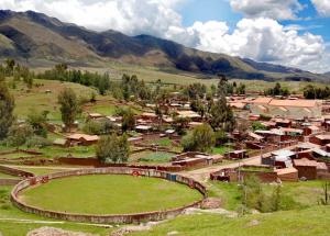 a small village in a valley with mountains in the background at Fully furnished 1bedroom apt in the Peruvian Andes in Sangarará