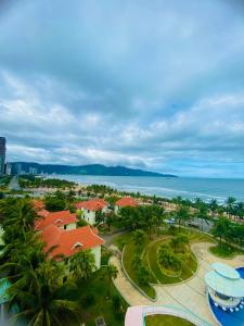 an aerial view of a resort with the ocean at Arrive Hotel & Apartment in Danang