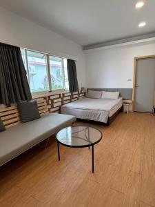 מיטה או מיטות בחדר ב-Summerflow Hostel