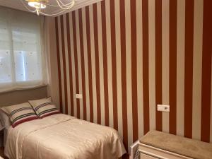 Postel nebo postele na pokoji v ubytování Bonito Apartamento con wifi y patio