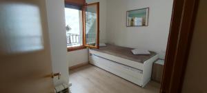 Postel nebo postele na pokoji v ubytování Superb flat in the centre of capital, ski, Caldea
