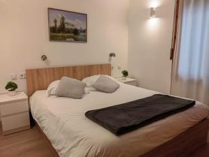 Postel nebo postele na pokoji v ubytování Superb flat in the centre of capital, ski, Caldea