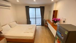 Postel nebo postele na pokoji v ubytování Era Cozy Apartment