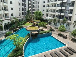 an overhead view of a swimming pool in a building at PARANAQUE STAYCATION at SPRING RESIDENCES T3 U1231 in Manila