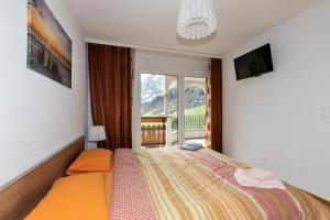 Postel nebo postele na pokoji v ubytování Residenz Ambassador + 37 fotografií