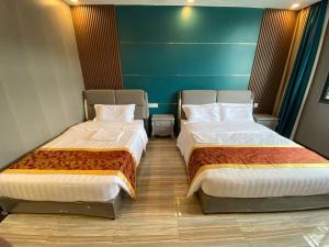 Lanting Villas客房内的一张或多张床位