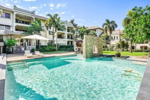 an image of a swimming pool at a house at 116 Cairns One in Cairns
