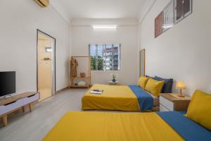 KLy Apartment Hotel客房内的一张或多张床位