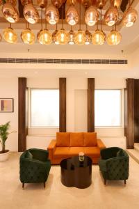 Posezení v ubytování Delite Sarovar Portico Faridabad