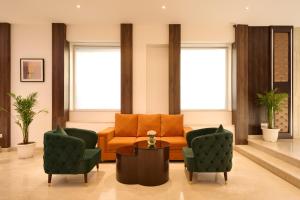 Posezení v ubytování Delite Sarovar Portico Faridabad