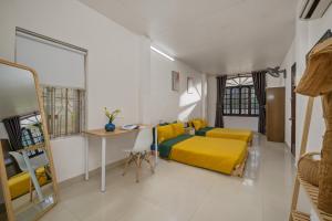 KLy Apartment Hotel客房内的一张或多张床位
