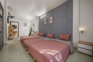 KLy Apartment Hotel客房内的一张或多张床位