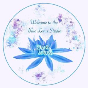 a blue flower with a welcome to the blue lotus studio at Blue Lotus Studio in Agia Marina Nea Kydonias