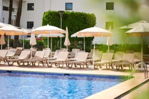 Bazén v ubytování AluaSun Continental Park Hotel & Apartments nebo v jeho okolí