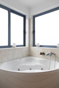 Ένα μπάνιο στο Ammos Boutique Hotel +97 φωτογραφίες