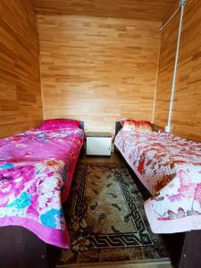 Postel nebo postele na pokoji v ubytování Sunrise