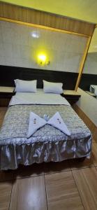Hostal Private-Lima Aiport客房内的一张或多张床位