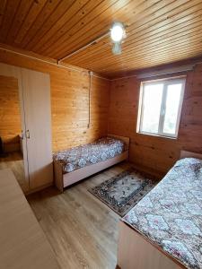 Postel nebo postele na pokoji v ubytování Sunrise