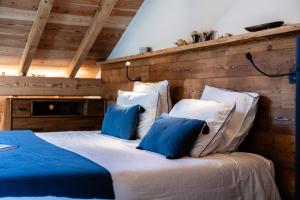 Postel nebo postele na pokoji v ubytování Chalet Le Refuge