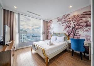 a hotel room with a bed and a large window at The landmark Luxury Vinhomes Apartments - The buildings nearby landmark 81 central in Ho Chi Minh City