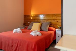 Postel nebo postele na pokoji v ubytování B&B La Timpa Del Cucco