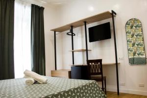 Postel nebo postele na pokoji v ubytování Hotel Ciao