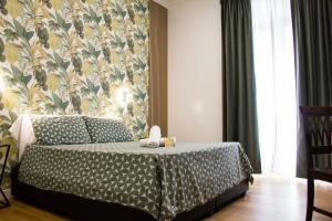 Postel nebo postele na pokoji v ubytování Hotel Ciao