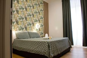 Postel nebo postele na pokoji v ubytování Hotel Ciao