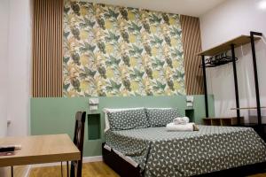Postel nebo postele na pokoji v ubytování Hotel Ciao