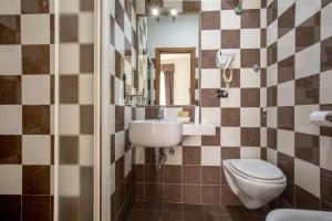 Koupelna v ubytování Hotel Ciao