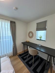 Una cama o camas en una habitación de スカイツリーまで徒步約10分、清潔、快適、便利、静か、設備完備！