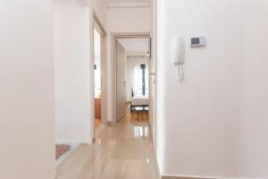Ένα ή περισσότερα κρεβάτια σε δωμάτιο στο Houseloft Urban Retreat