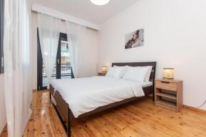 Giường trong phòng chung tại Houseloft Urban Retreat